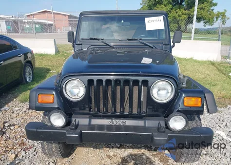 2002 Jeep Wrangler Sport из США, поврежденный, VIN 1J4FA49S52P753899